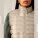 Dámska vesta Stella Climber - stjw838-desertdust_studio_lifestyle_detail_front - variant Eg STJW838C0281L