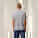 Pánske polo tričko Stanley Coaster - stpm224-heathergrey_studio_lifestyle_main_back - variant Eg STPM224C2501L