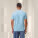 Pánske polo tričko Stanley Coaster - stpm224-skyblue_studio_lifestyle_main_back - variant Eg STPM224C2321L