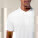 Pánske polo tričko Stanley Coaster - stpm224-white_studio_lifestyle_detail_front - variant Eg STPM224C0011L