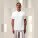 Pánske polo tričko Stanley Coaster - stpm224-white_studio_lifestyle_main_front - variant Eg STPM224C0011L