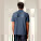 Unisex polo tričko Prepster 2.0 - stpu222-darkheatherblue_studio_lifestyle_main_back - variant Eg STPU222C6521L