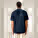 Unisex polo tričko Prepster 2.0 - stpu222-frenchnavy_studio_lifestyle_main_back - variant Eg STPU222C7271L