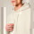 Unisex mikina s kapucňou Striker s voľným raglánovým vzorom - stsu202-naturalraw_studio_lifestyle_detail_front - variant Eg STSU202C0541L