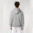 Unisex mikina s kapucňou voľného strihu Slammer - stsu856-heathergrey_studio_lifestyle_main_back - variant Eg STSU856C2501L