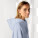 Unisex mikina s kapucňou voľného strihu Slammer - stsu856-sereneblue_studio_lifestyle_detail_front - variant Eg STSU856C0571M