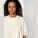 Blaster unisex oversized tričko s vysokým výstrihom - sttu815-naturalraw_studio_lifestyle_detail_front - variant Eg STTU815C0541L