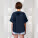 Stella Collider dámske tričko s vyhrnutým rukávom - sttw089-frenchnavy_studio_lifestyle_main_back - variant Eg STTW089C7271L