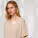 Stella Collider dámske tričko s vyhrnutým rukávom - sttw089-heatherrainbow_studio_lifestyle_detail_front - variant Eg STTW089C0841L