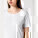 Stella Serena dámske tričko s hlbokým výstrihom - sttw173-white_studio_lifestyle_detail_front - variant Eg STTW173C0011L