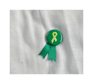 Solidario placka so špendlíkom